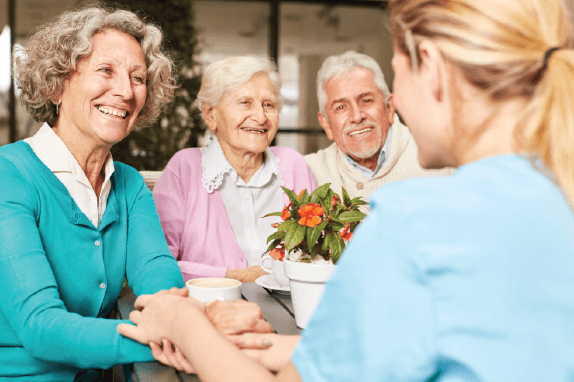 Caregiver assisting an elderly woman with daily home care tasks in Emeryville, CA