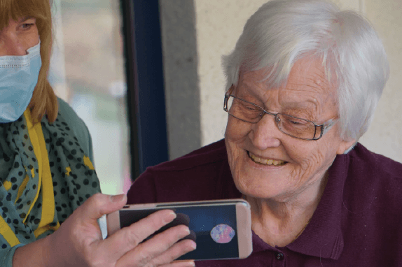 Polaris Home Care professional preparing a meal for a senior client